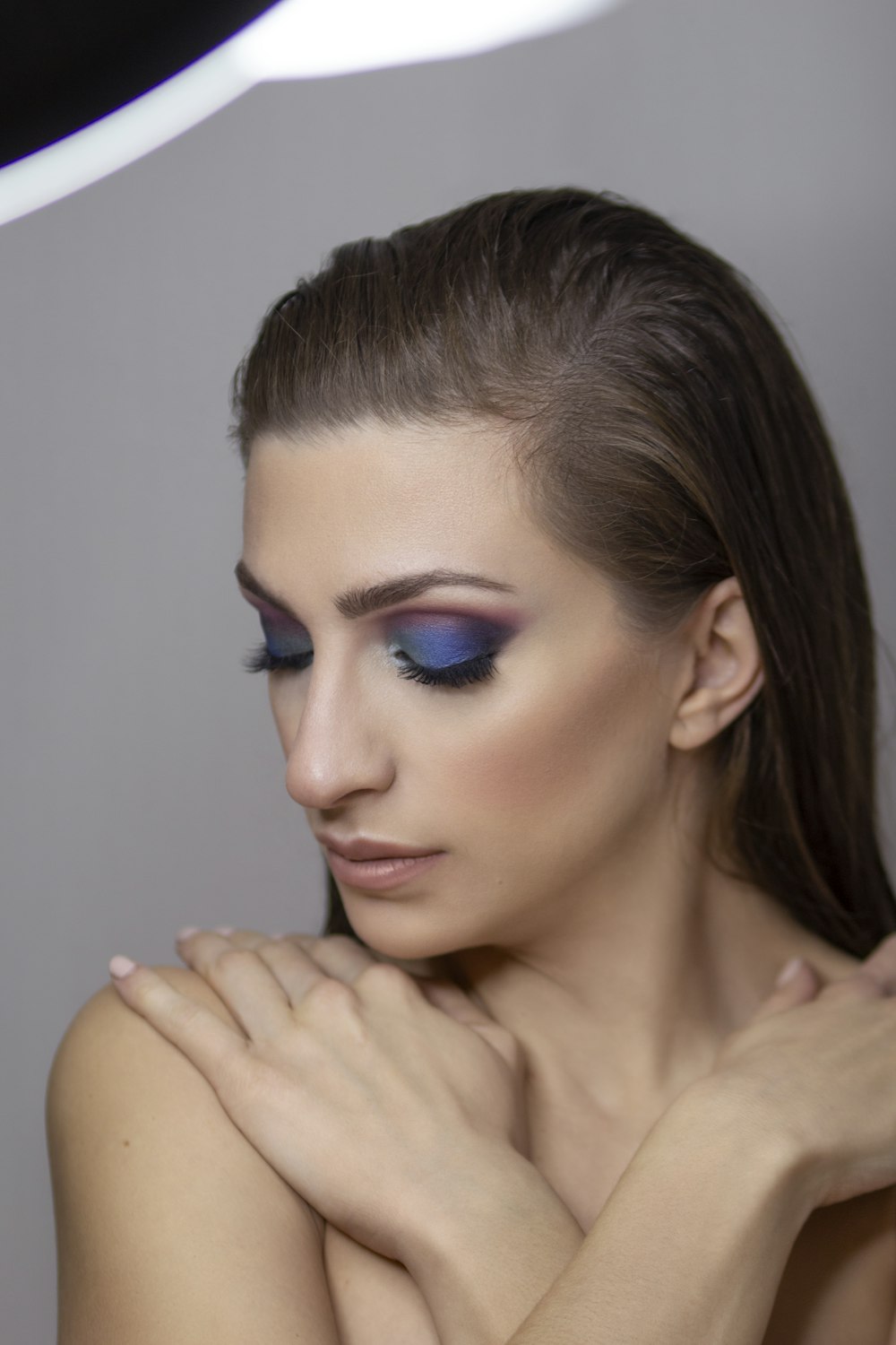 woman with blue eyes and brown hair