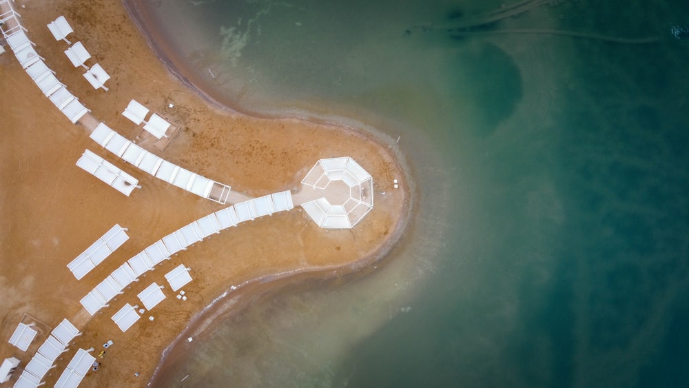 aerial view of white and brown wooden dock