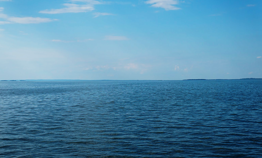 blue sea under blue sky during daytime