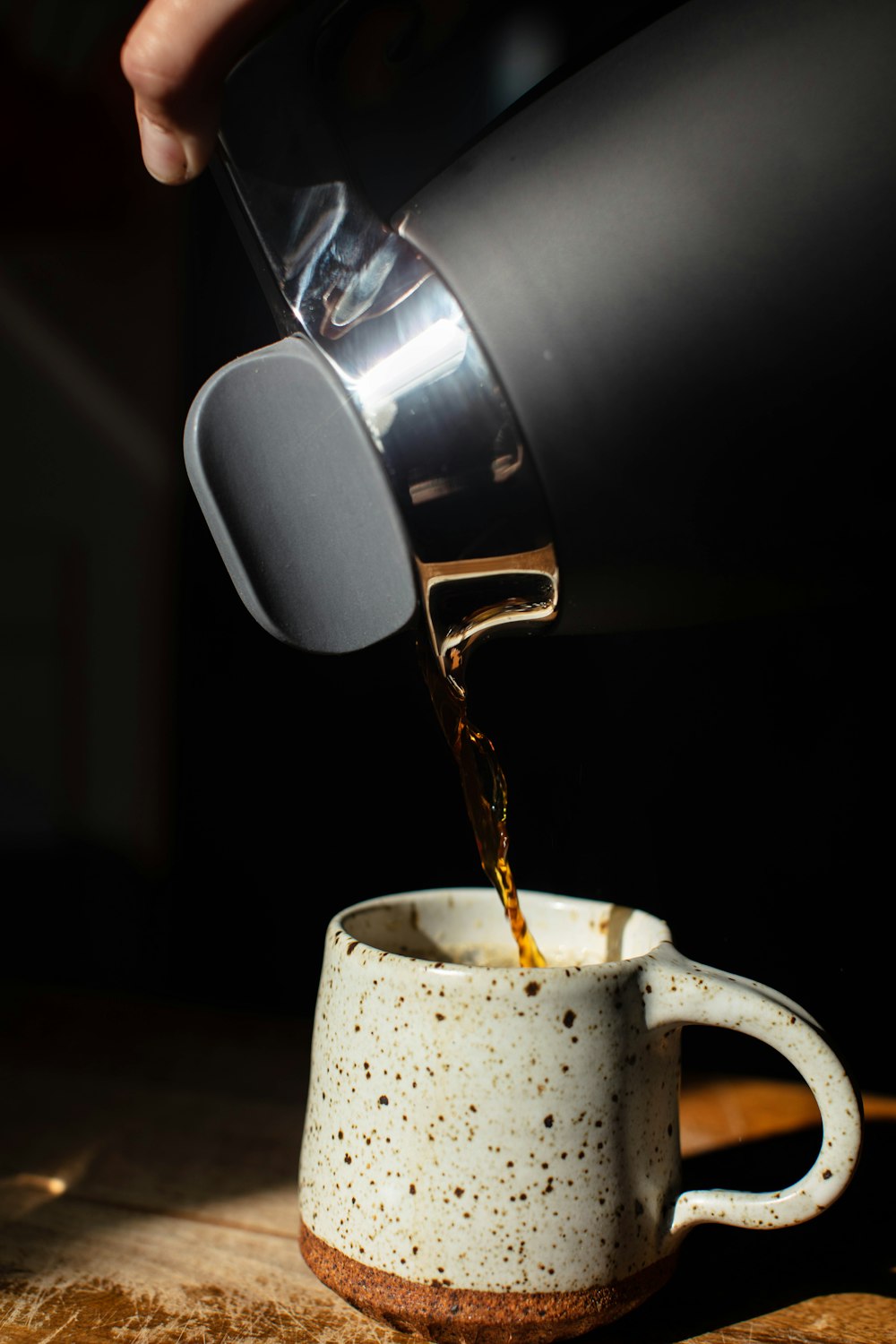 white ceramic mug with coffee