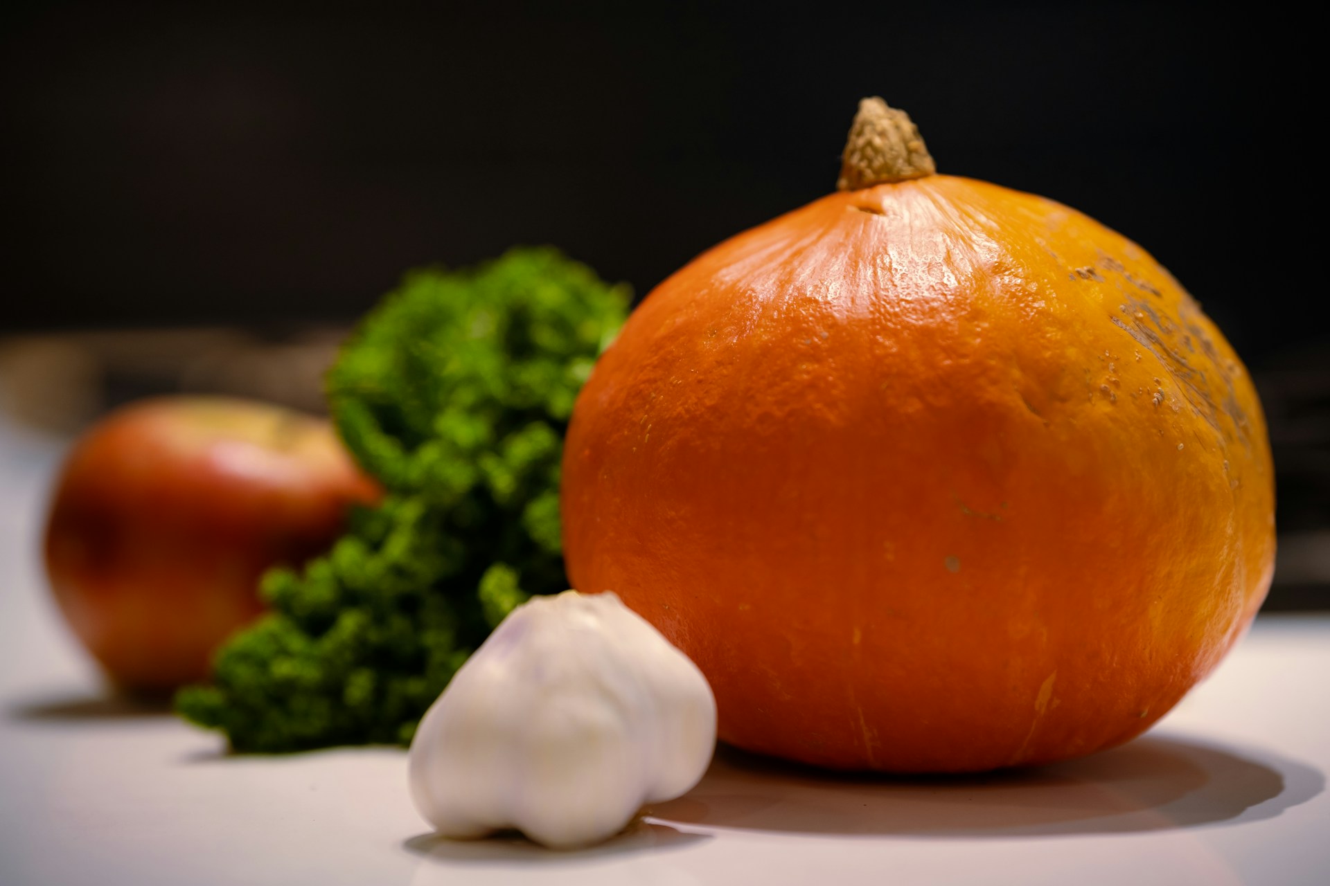 orange fruit on white table