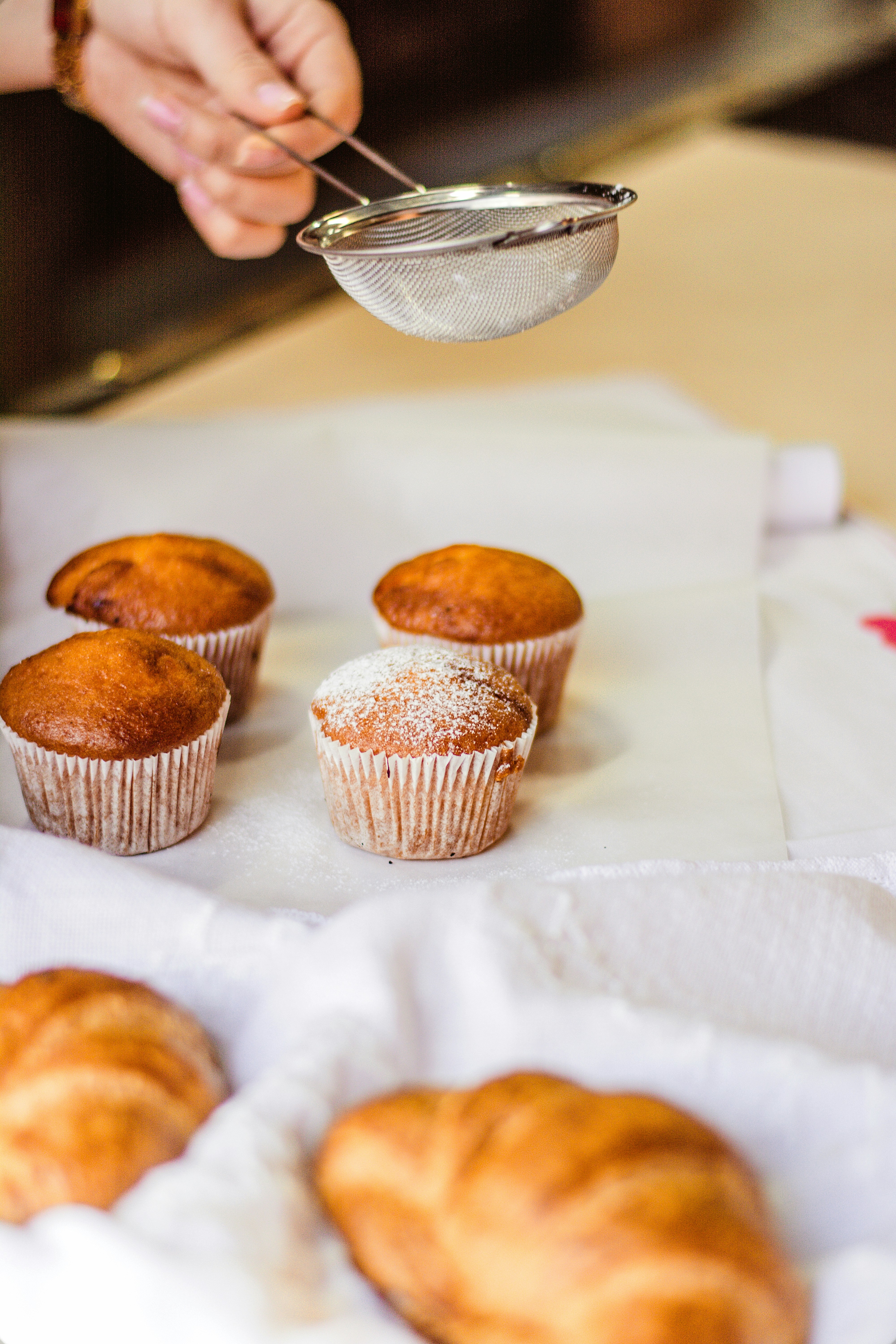 three-cupcakes-on-white-tissue-paper