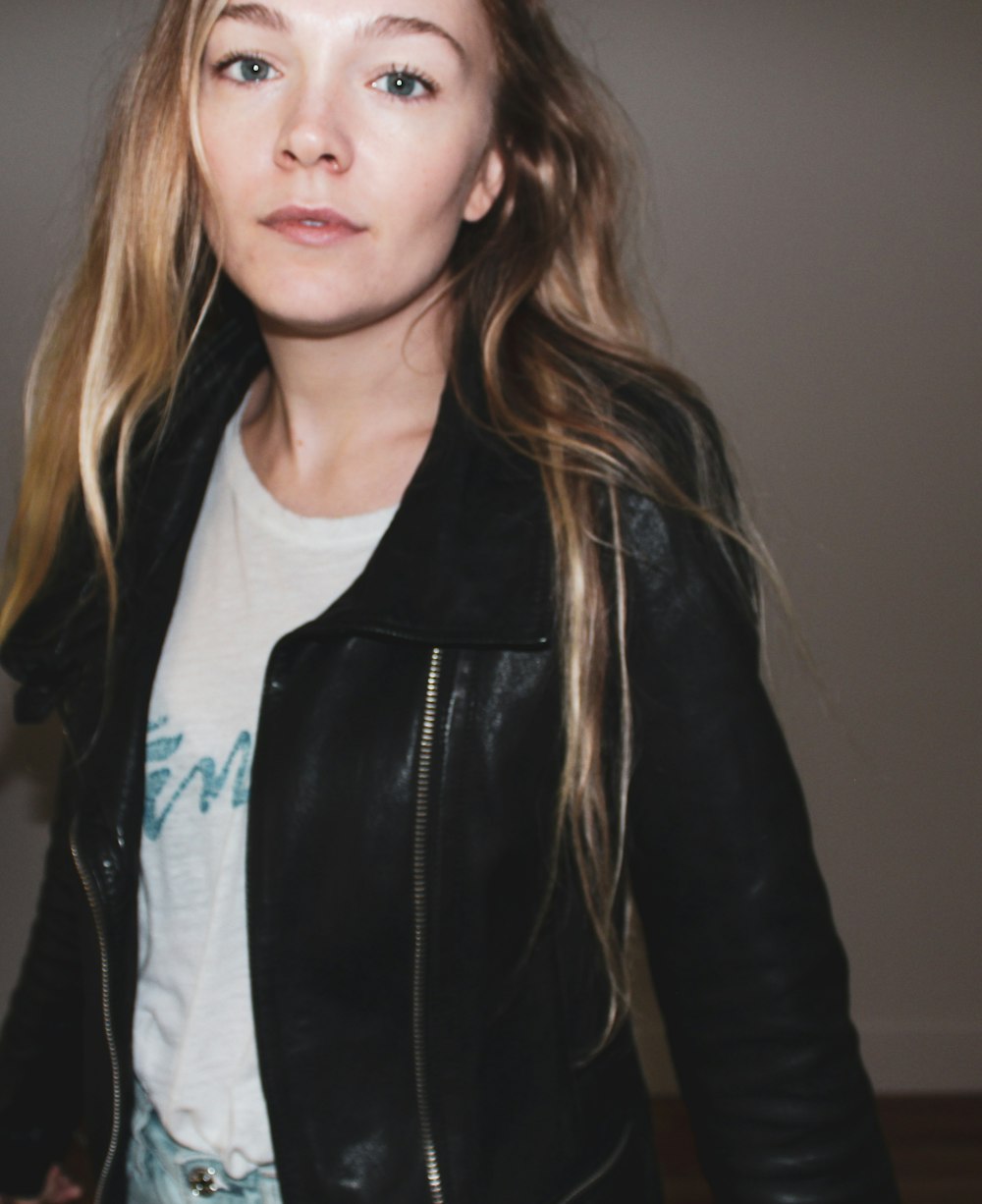 woman in black leather jacket