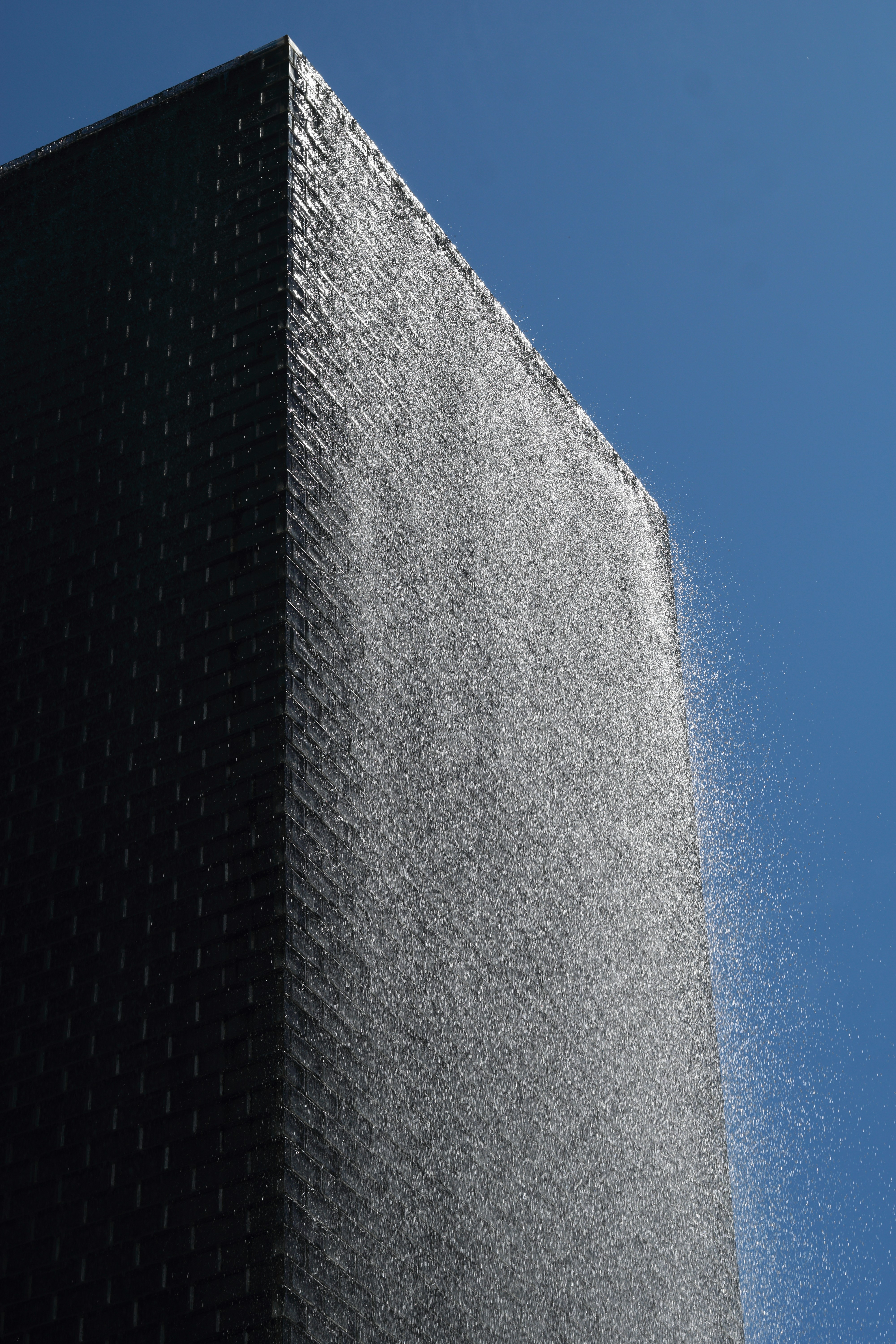 grey concrete building under blue sky during daytime