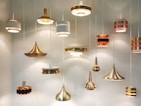 A variety of interior lights displayed together, showcasing different styles and finishes.