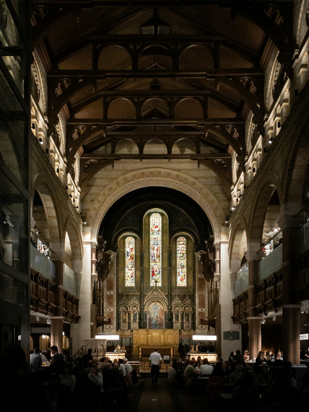 brown wooden chairs inside cathedral