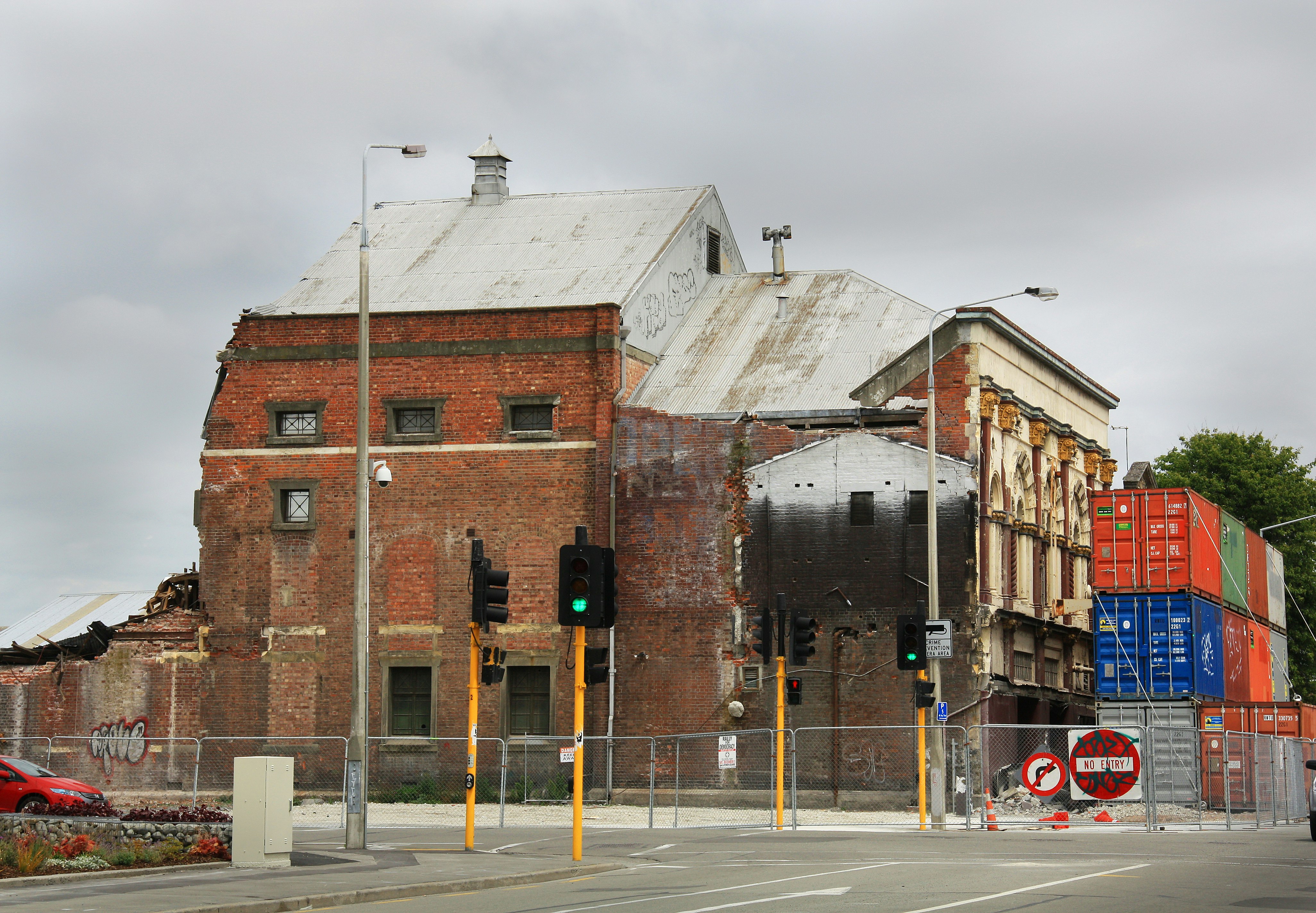 brown brick building near road during daytime