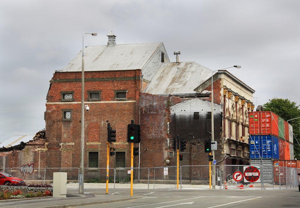 brown brick building near road during daytime