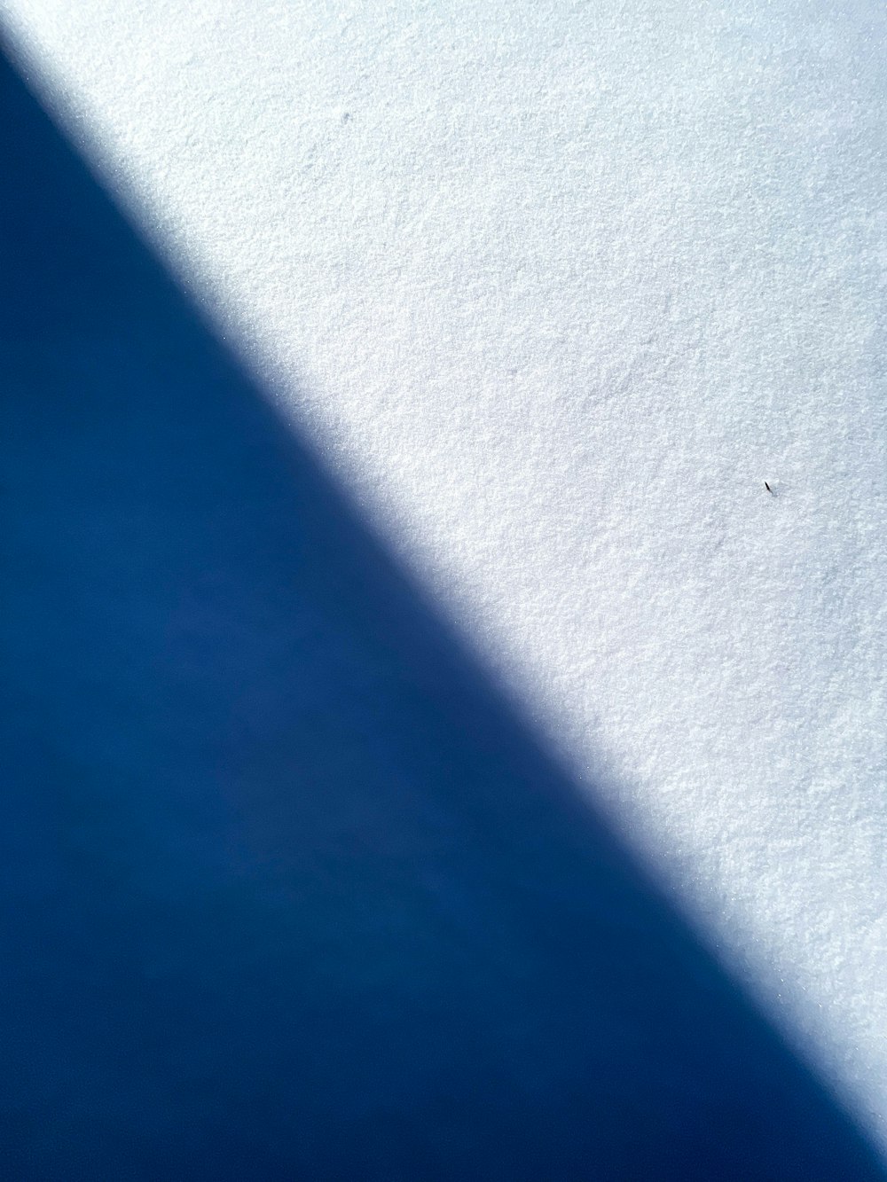 blue textile on gray textile