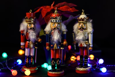 santa claus figurine with lights nutcracker teams background