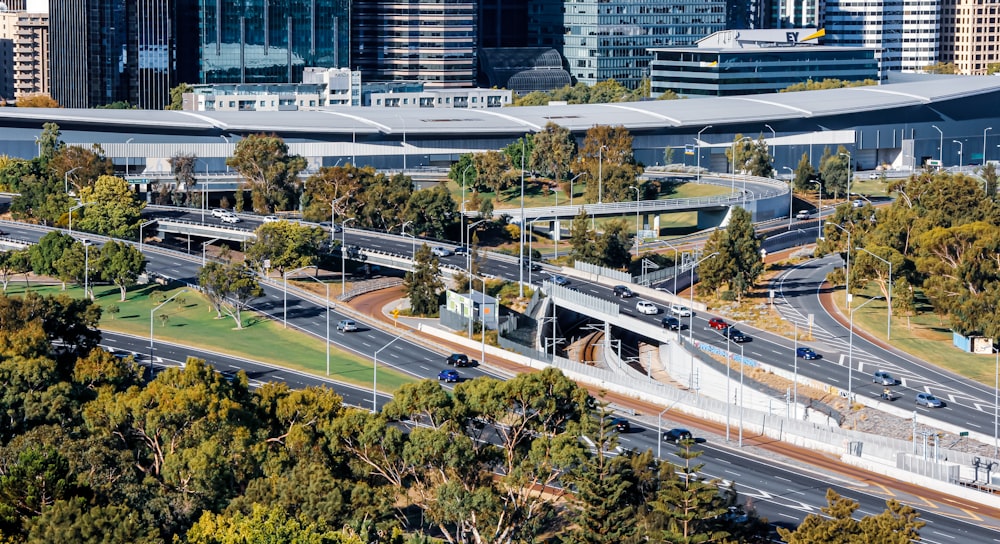 white and red train on rail road during daytime