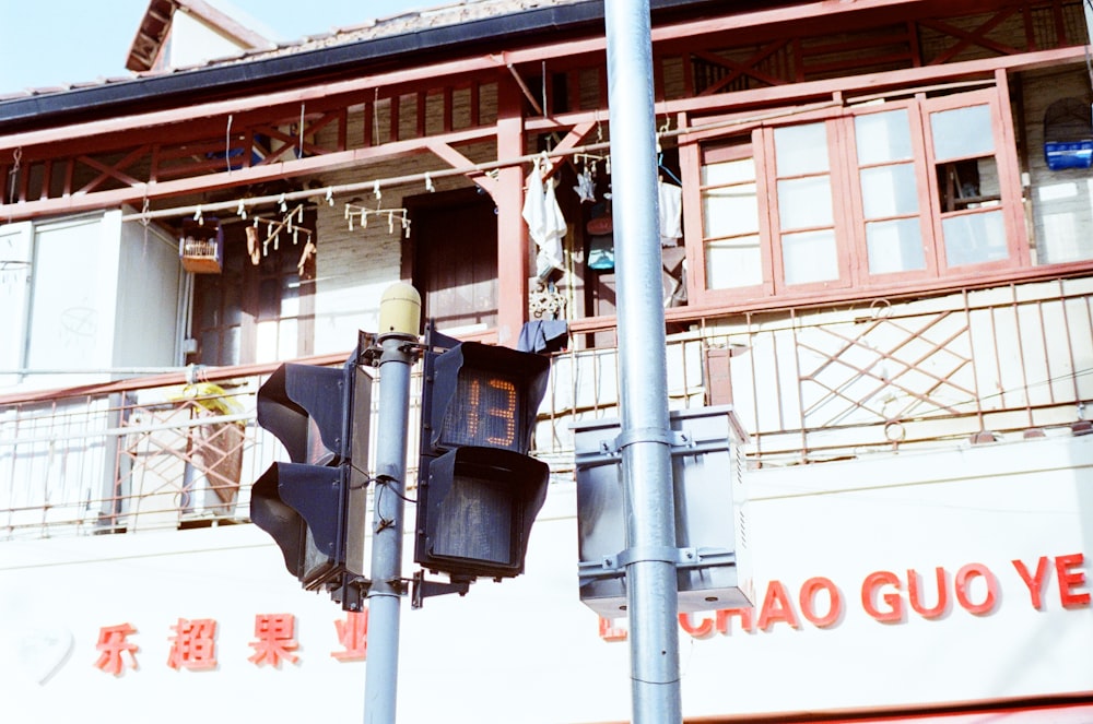 green traffic light on gray steel post