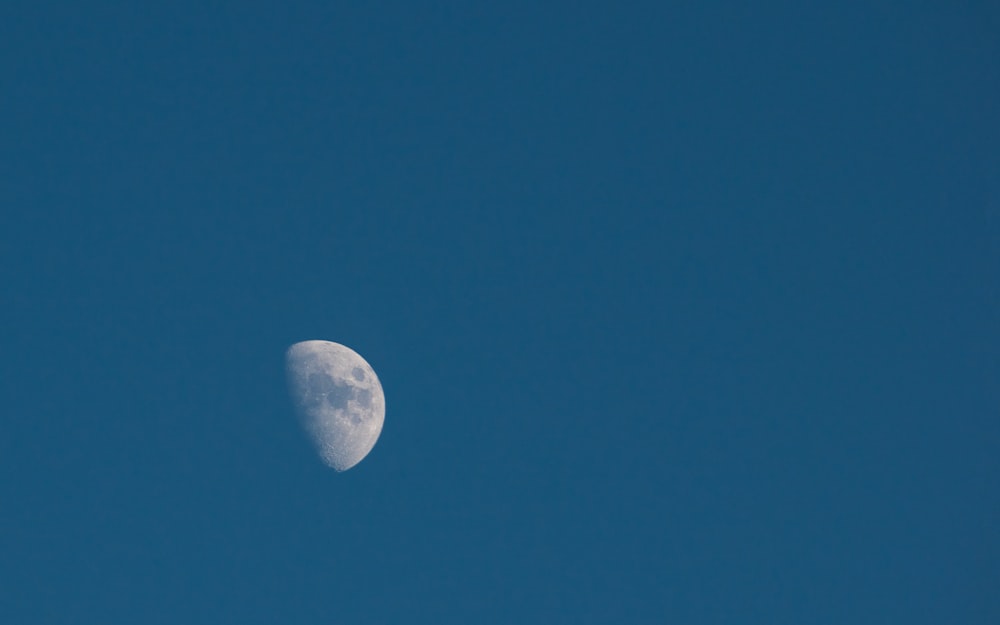 full moon in blue sky