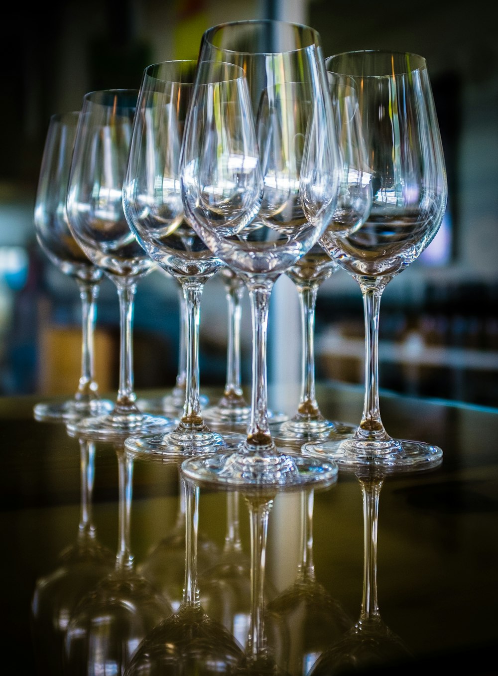 clear wine glasses on black table