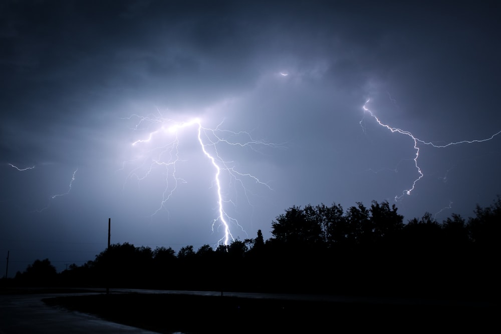 a lightning bolt hitting through a dark sky