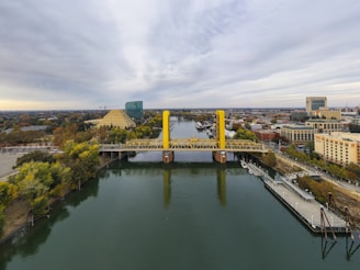 bridge over river during daytime