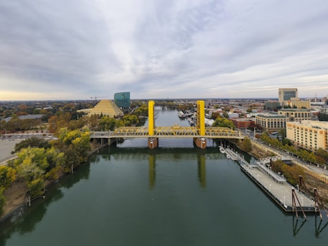 bridge over river during daytime