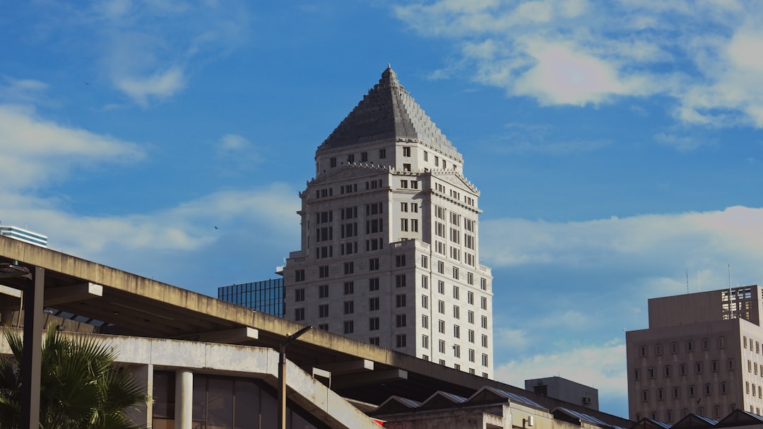 brown concrete building under blue sky during daytime