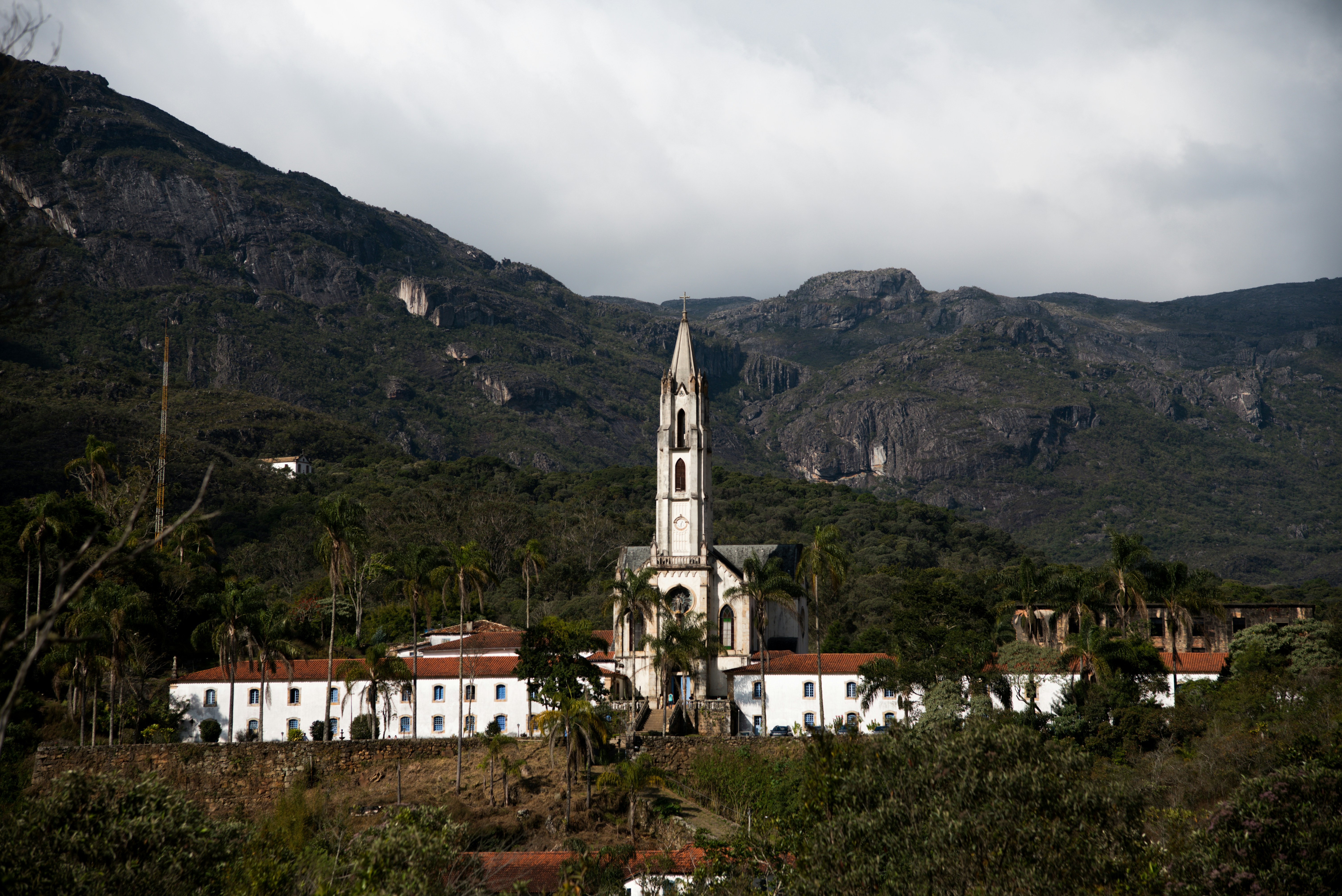 Santuario do Caraça in Portuguese, is an unusual destination. It is as much a place of spiritual pilgrimage as it is a nature sanctuary. Established in 1774 by a Portuguese monk Brother Lourenço, Caraça has been later converted into a seminary that served as an important Catholic educational institution for 148 years. The architectural complex at Caraca consists of a neo-Gothic church bookended by the side wings of a two-story Baroque-style building that houses the living quarters, the two dining halls and various other facilities.