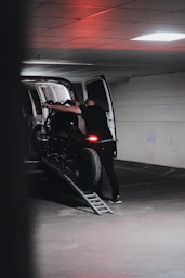 black suv in a garage