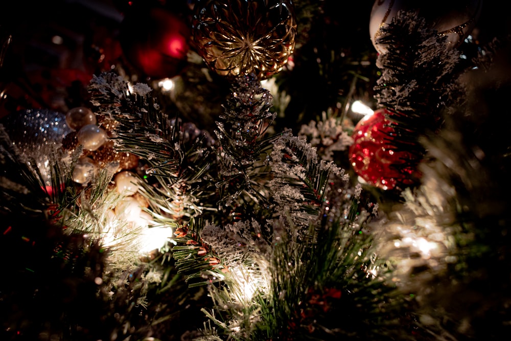 green christmas tree with red and gold baubles