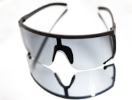 black framed black lens sunglasses