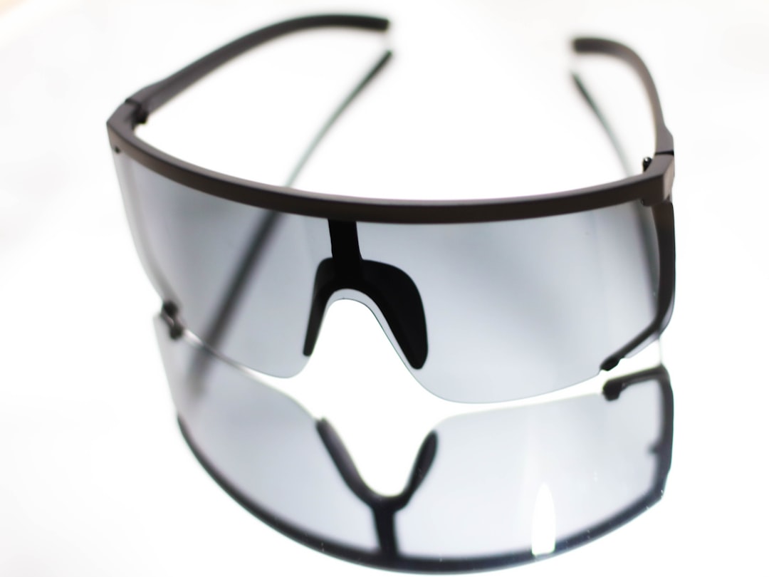 black framed black lens sunglasses