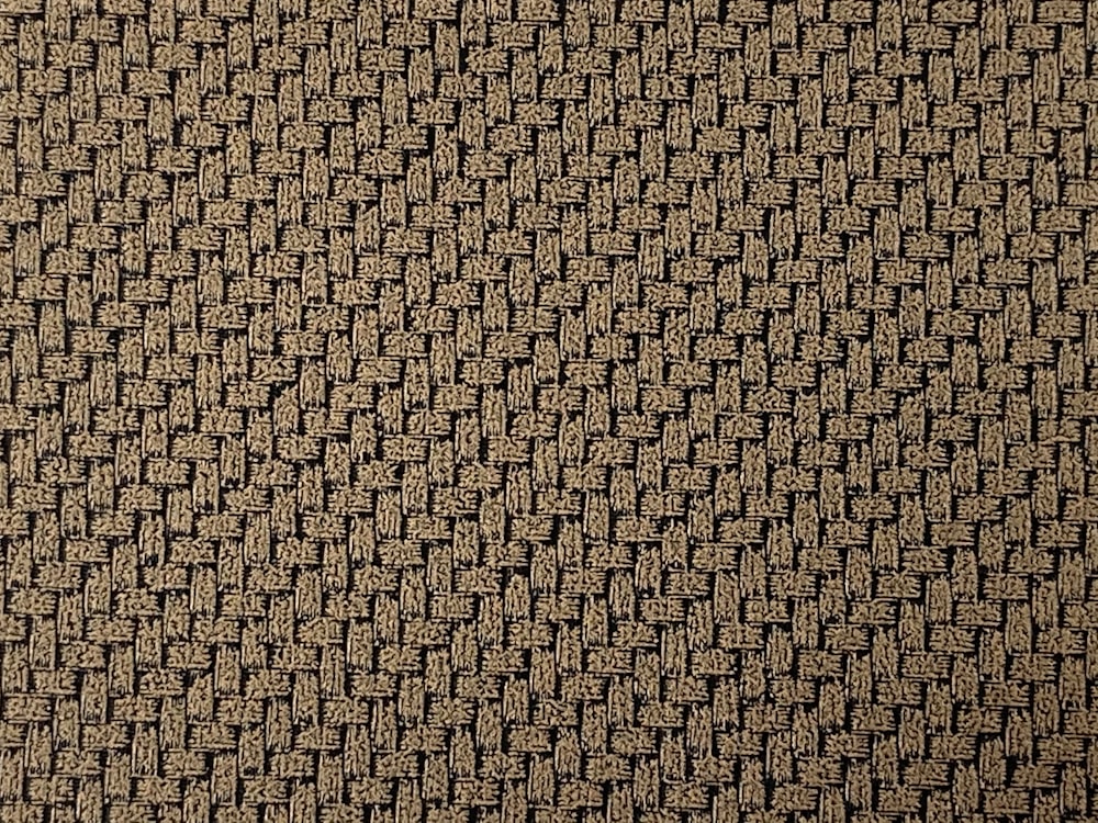 brown and black textile in close up photography