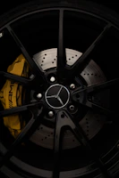 Set of premium brake pads installed on a sports car wheel