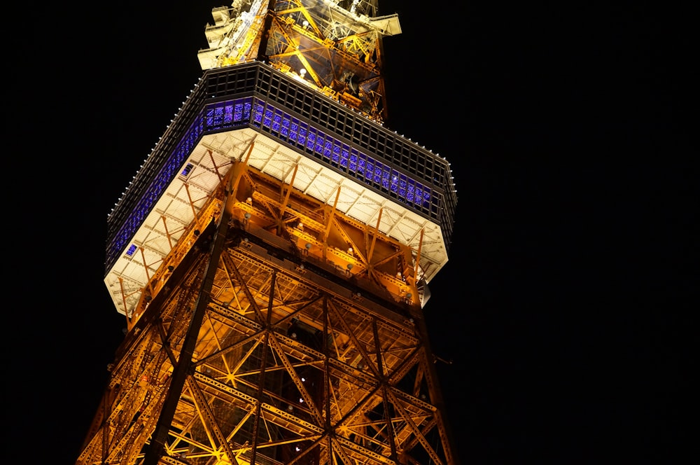 brown and white tower during night time