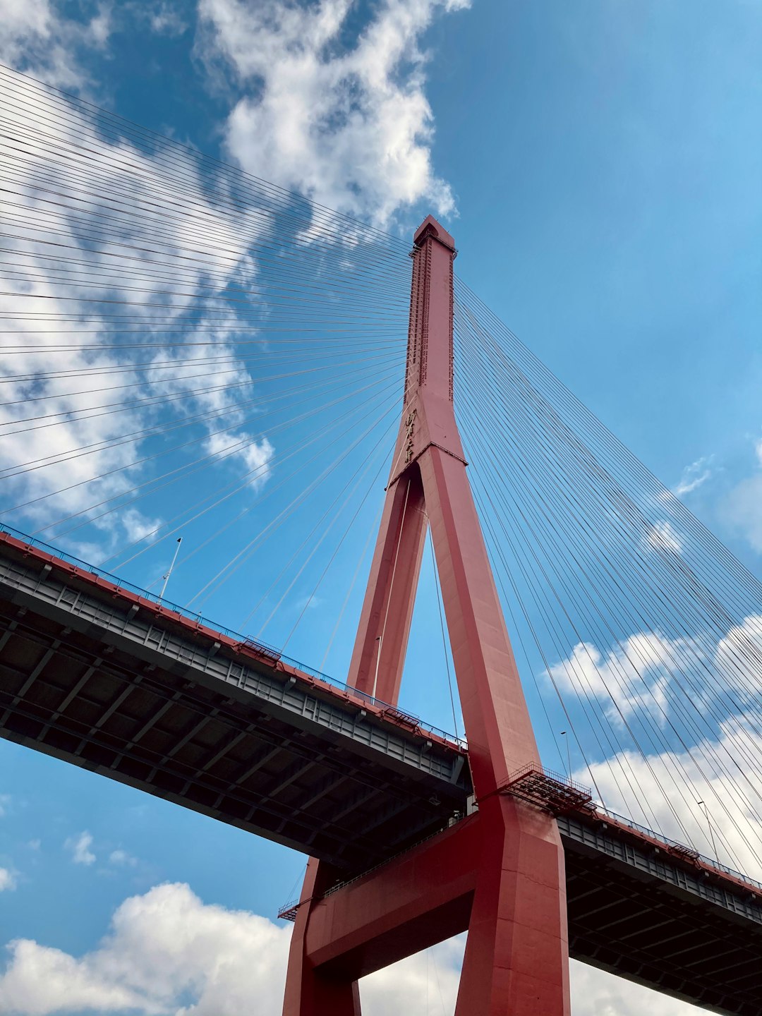 brown bridge under blue sky during daytime