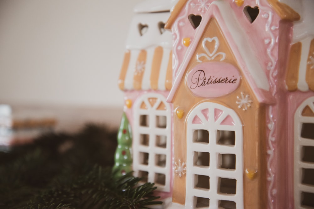 white and pink house miniature