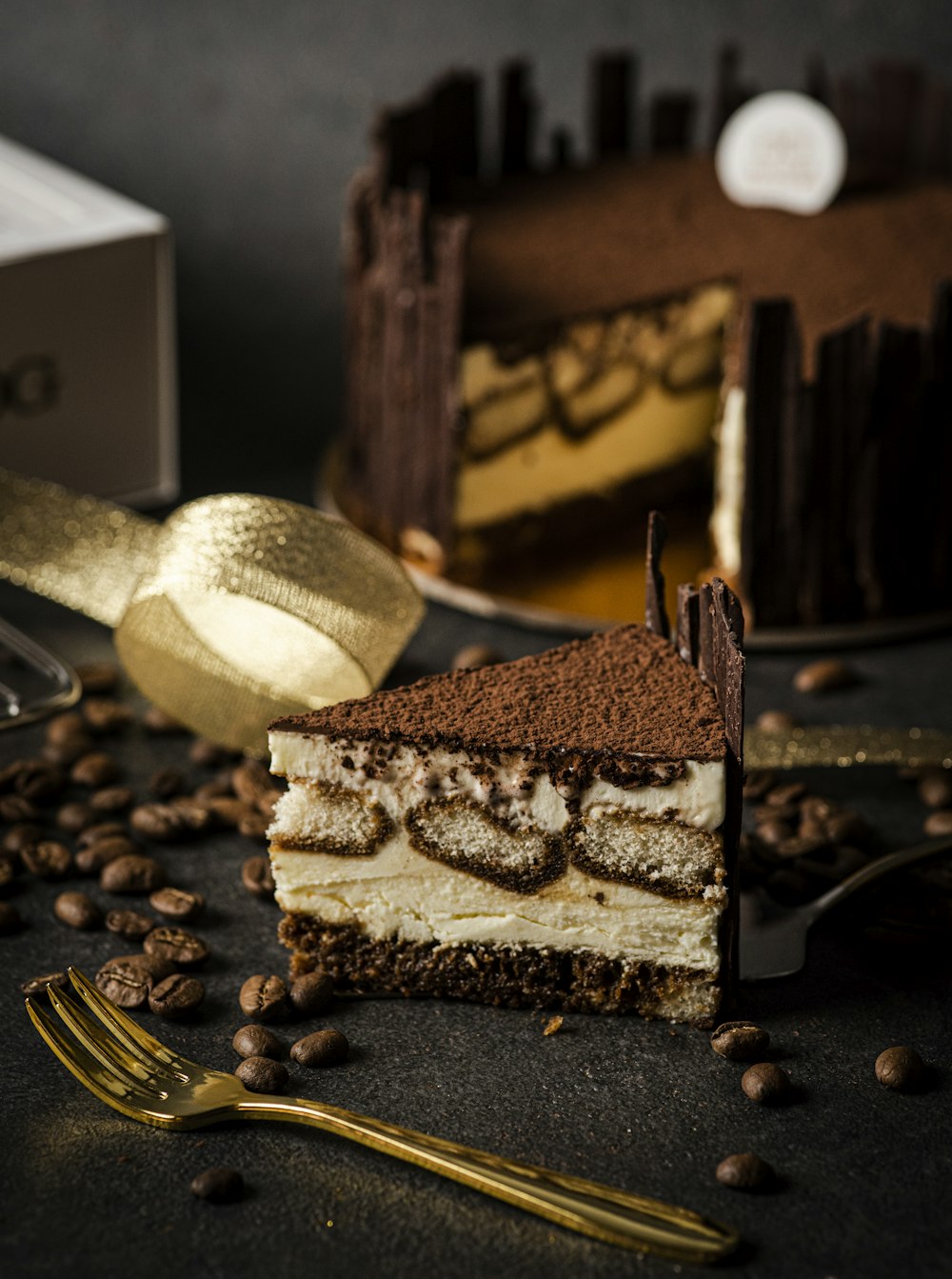 sliced chocolate cake on black table