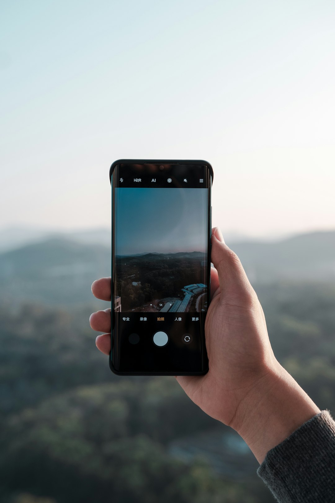 person holding black android smartphone