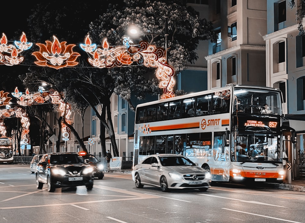 cars parked on the side of the road during night time