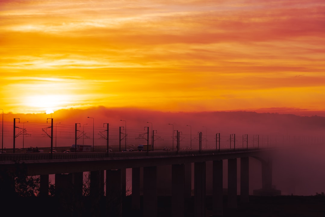 silhouette of dock during sunset