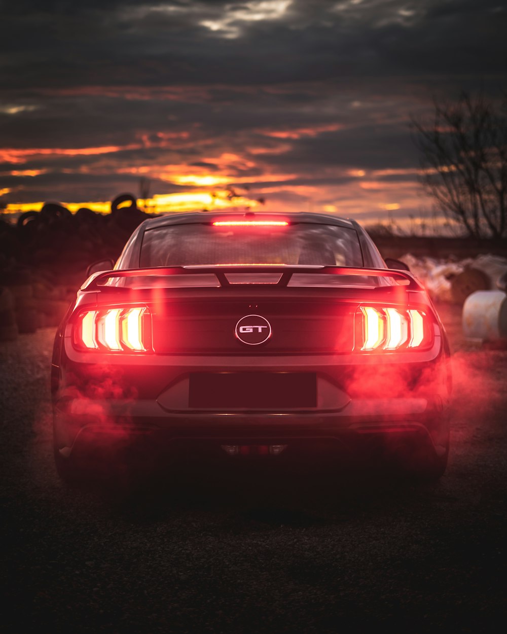 red bmw m 3 on road during sunset