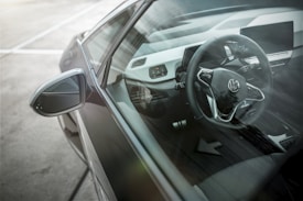 black car side mirror during daytime