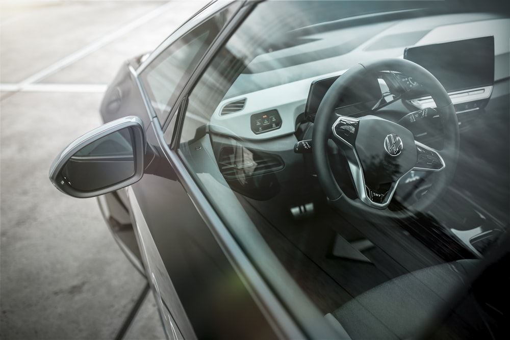 black car side mirror during daytime