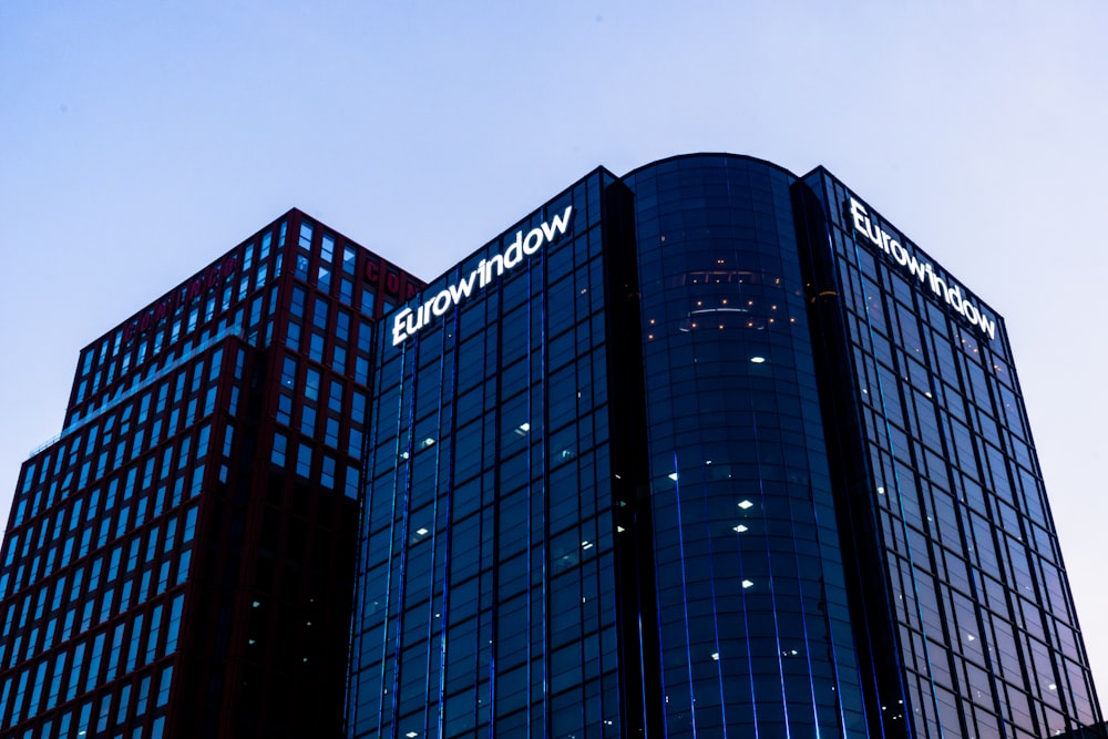 blue and black glass walled building