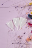 white ceramic cup on white surface