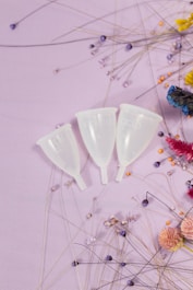 white ceramic cup on white surface