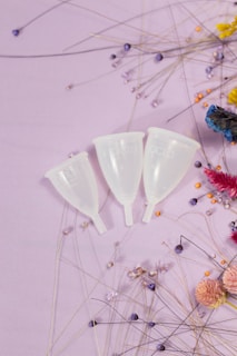 white ceramic cup on white surface