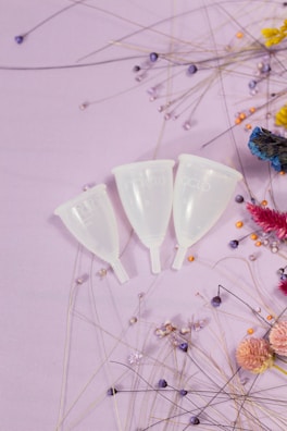 white ceramic cup on white surface