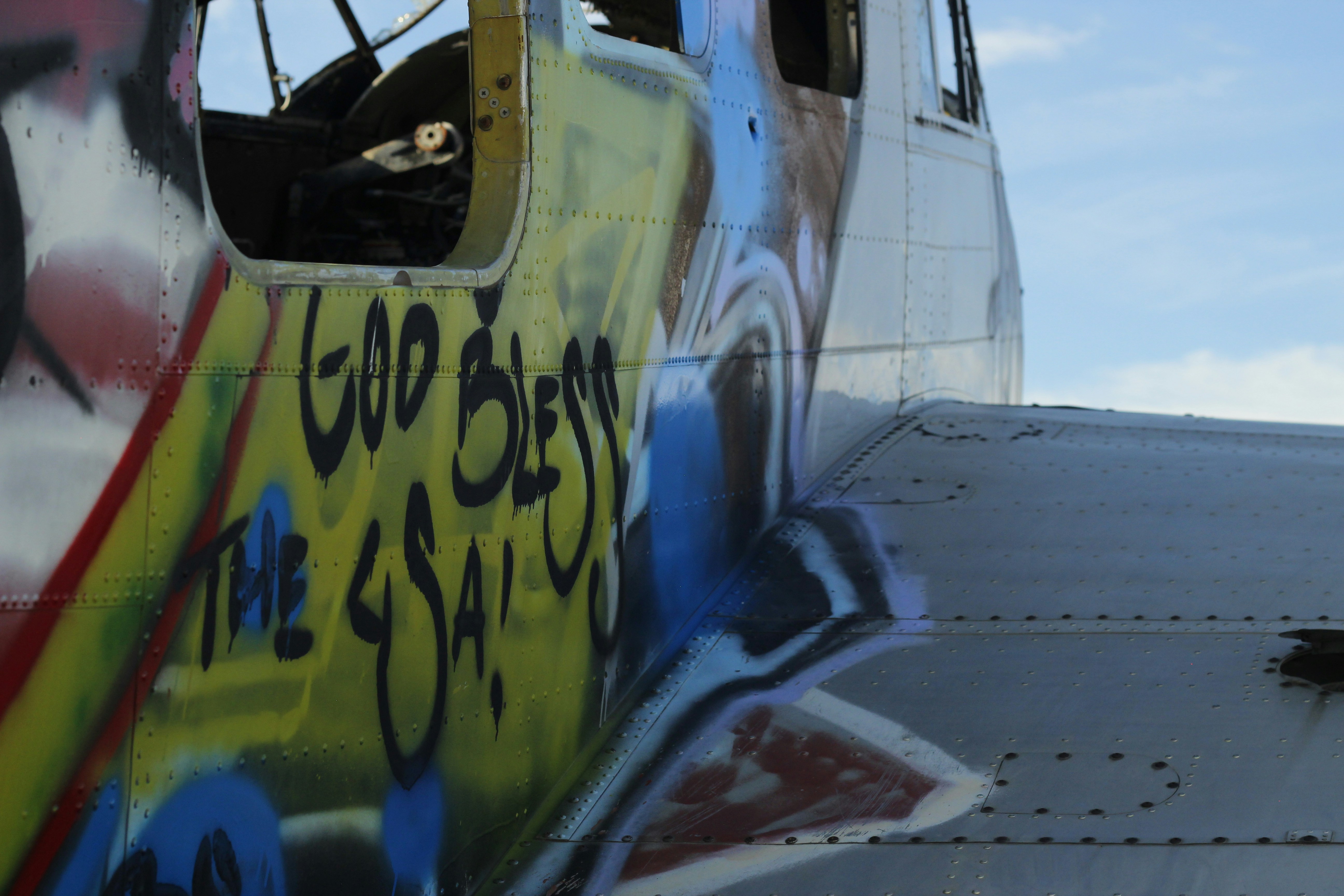 blue and white airplane during daytime