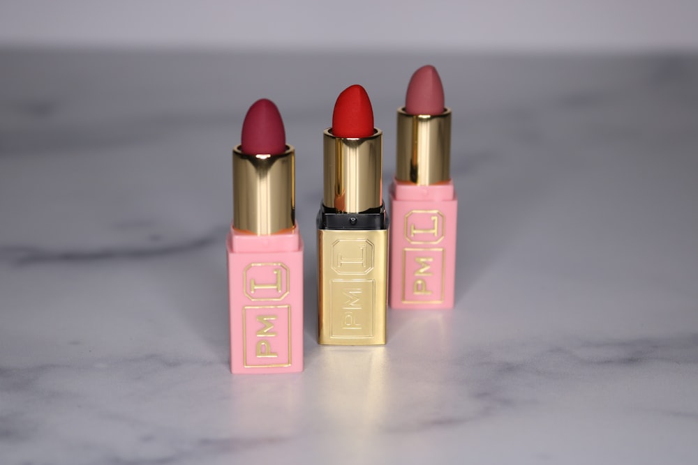 two pink and red lipstick