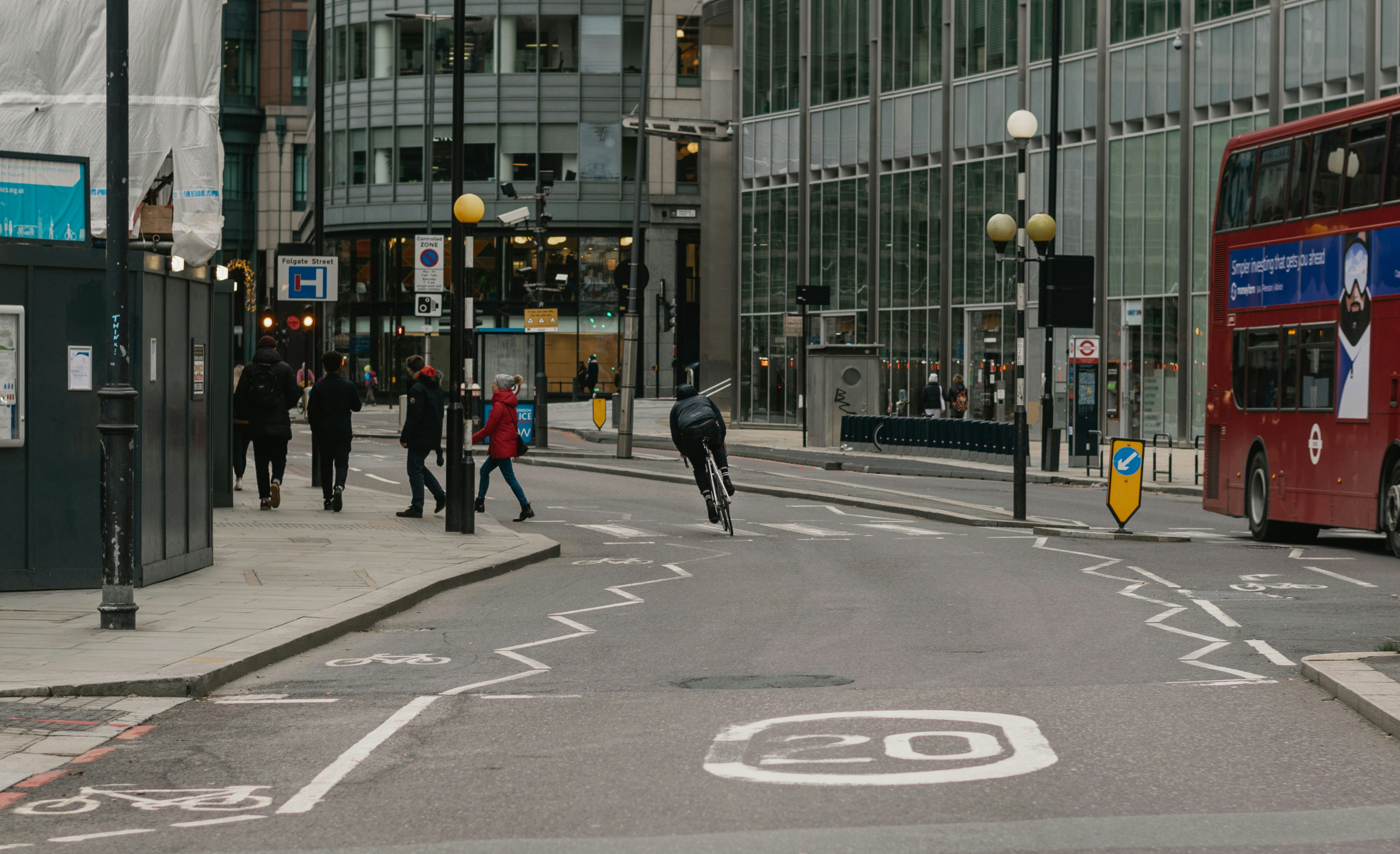 People walking on pedestrian lane during daytime