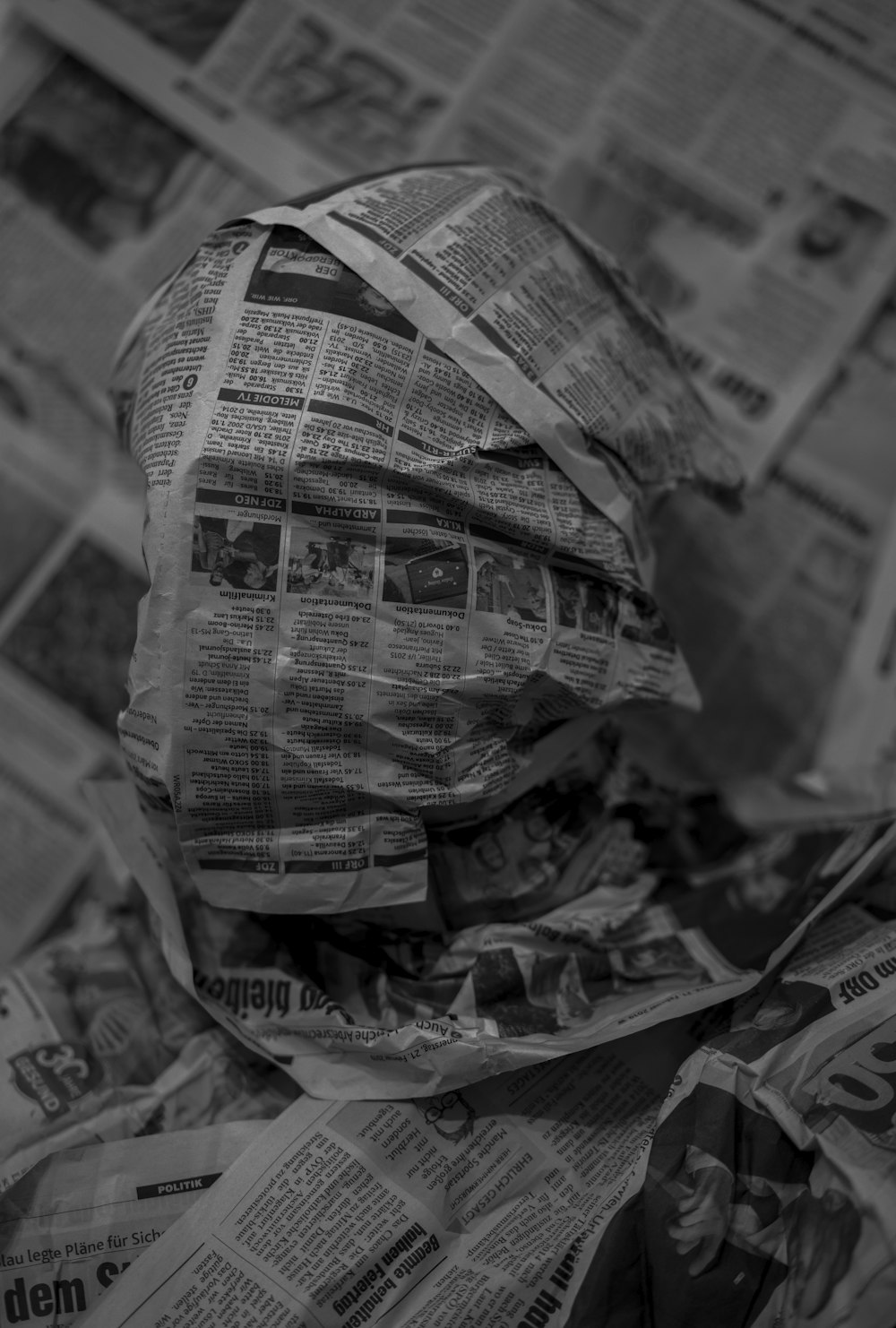 grayscale photo of a newspaper
