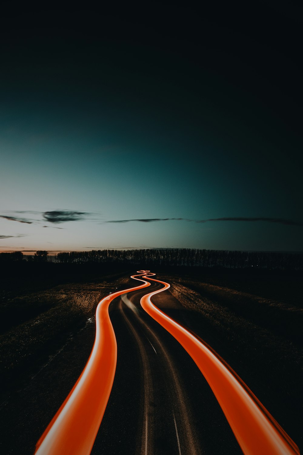 time lapse photography of road during night time