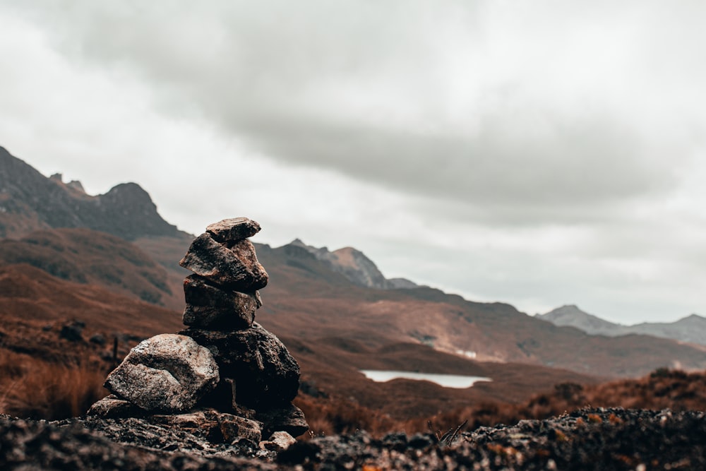 black rock formation on brown rocky mountain during daytime